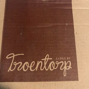 Clogs worn one time in the house purple in color